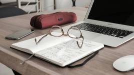 glasses on a notebook